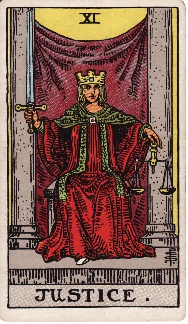 justice tarot card. Sitting on a throne. 